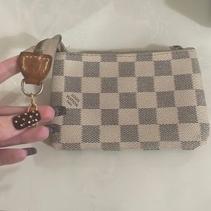 Louis Vuitton coin purse/card holder. Moderate condition.